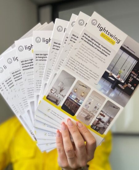 paper lightswing manuals holding in hand